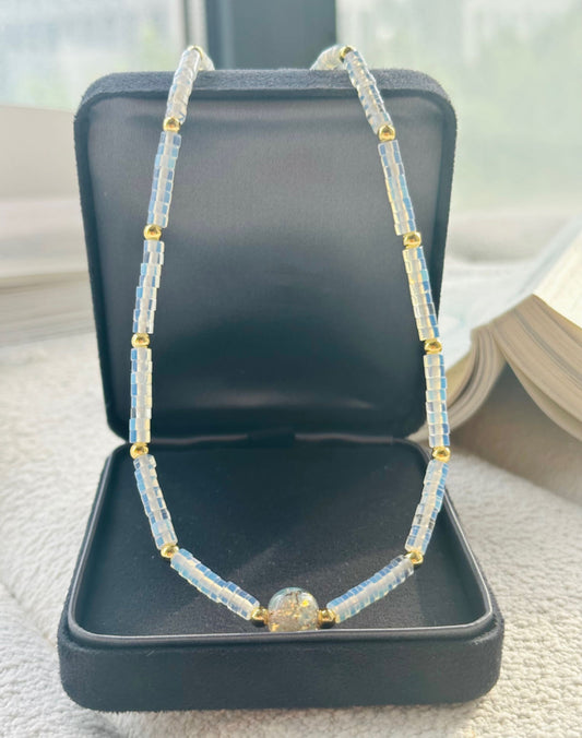 Elegant Light Blue Crystal Wheel Necklace with Gold and Gradated Crystal Beads