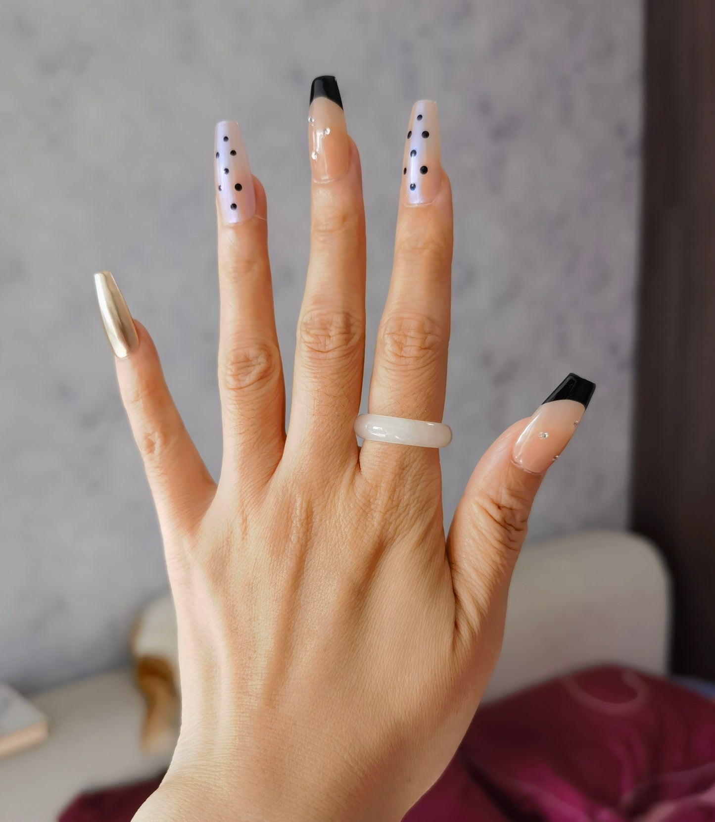 Audrey Hepburn's iconic style | Classic Black Dot French Tip Nails