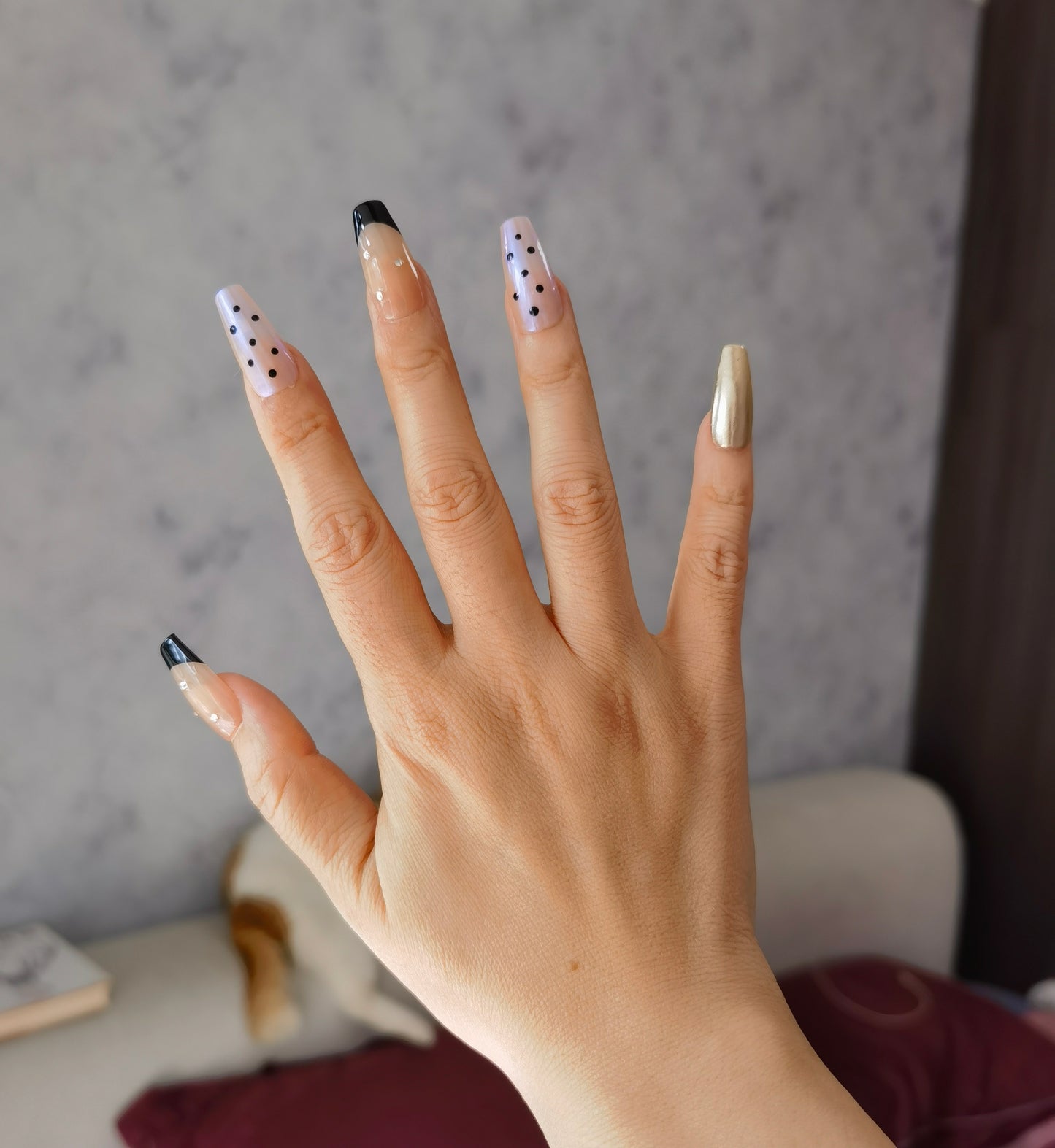 Audrey Hepburn's iconic style | Classic Black Dot French Tip Nails