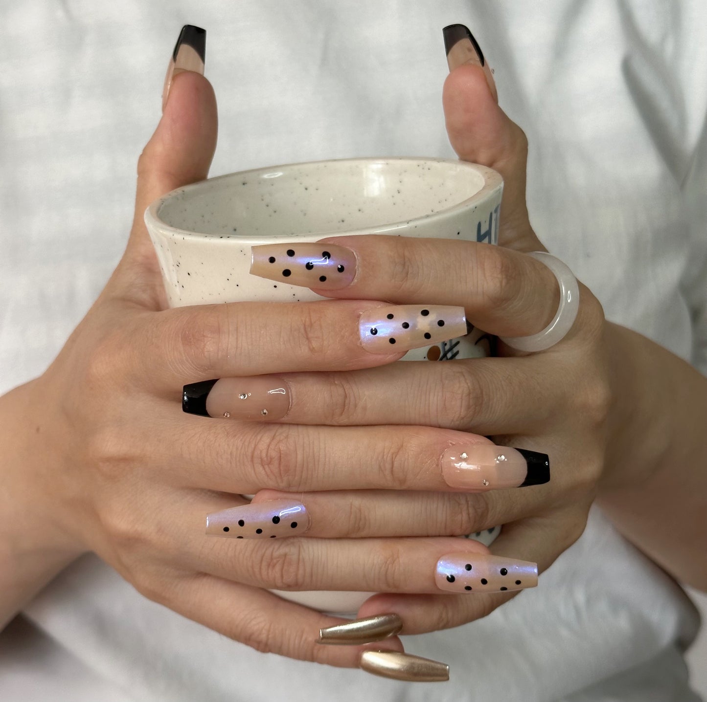 Audrey Hepburn's iconic style | Classic Black Dot French Tip Nails